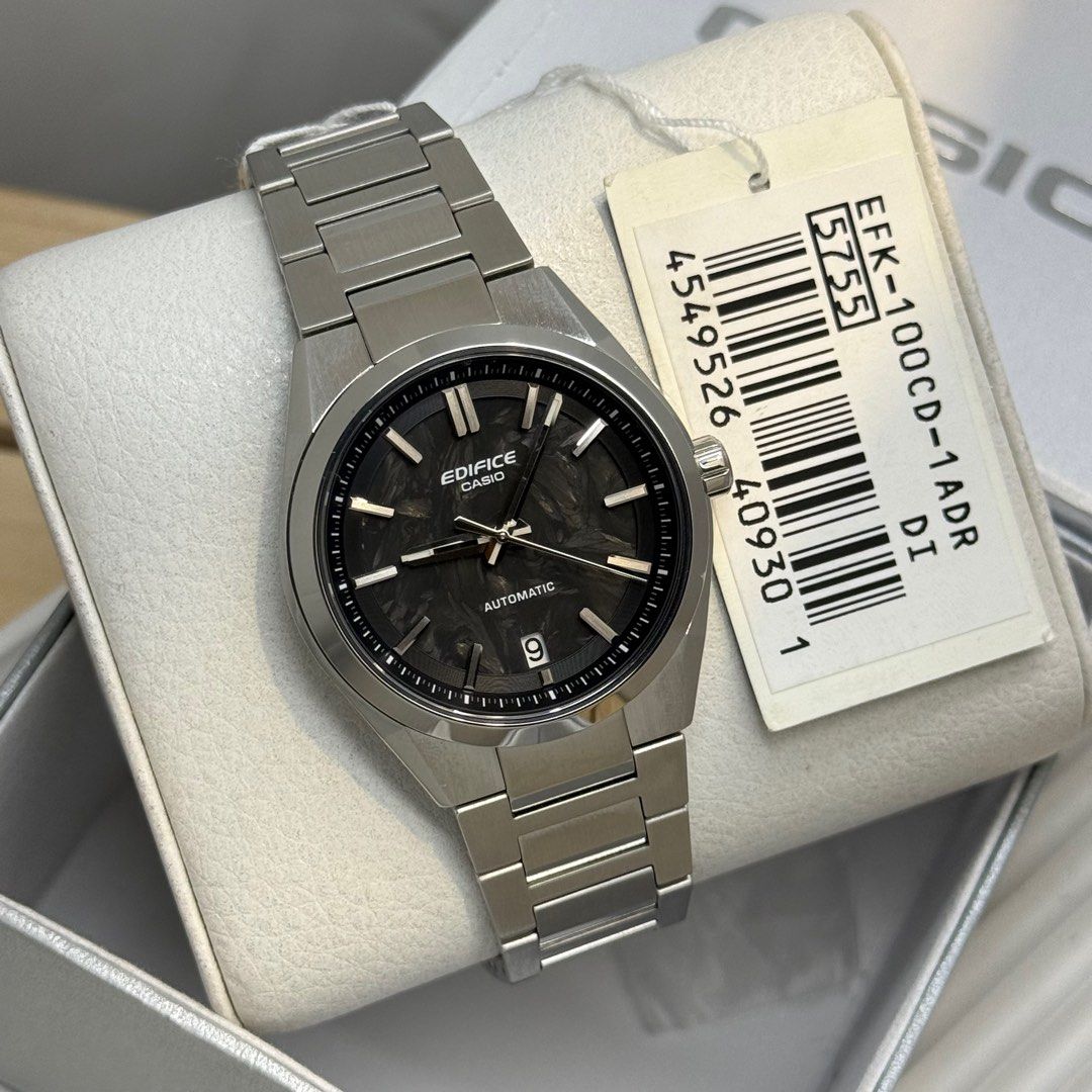 Casio Edifice EFk-100CD Automatic watch (Category: Men's Watches) located in Quezon City. Submitted by micoyski (Listing ID 1402065665, Image 2). Description: Edifice Casio automatic watch with stainless steel strap. Available in three dial colors: black, blue, and green. Features a date display. The watch is new and comes with its original box and tags. The watch has a sleek, modern design suitable for everyday wear. Sapphire glass 39mm.