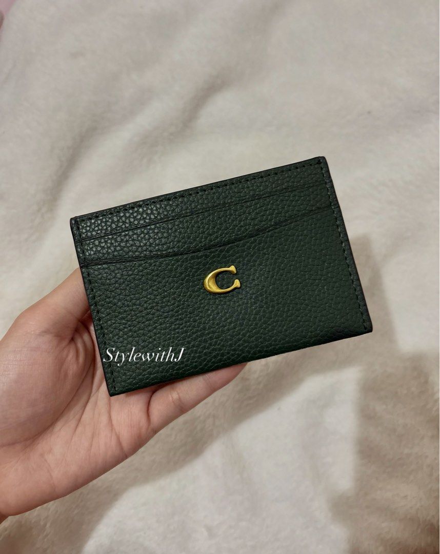 Coach Card Case Wallet (Category: Luxury Bags & Wallets) located in Las Pinas. Submitted by bagsnclothesby.j (Listing ID 1402059916, Image 3). Description: - Dark green color - Multiple card slots - Slim design Brandnew with inclusions! Lalamove ready.