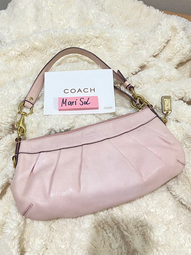 Coach Pink Leather shoulder bag handbag (Category: Luxury Bags & Wallets) located in Bulacan. Submitted by marisolugay (Listing ID 1401990519, Image 1). Description: Issue mejo fade ang pagka pink nya my konting crack ang creed serial Number sa loob sign of usage - Authentic Coach handbag - Made of pink leather - Features a zip closure - Includes a handle - Gold-tone hardware - Interior Coach label - Pleated design - Small Coach tag - Serial numb