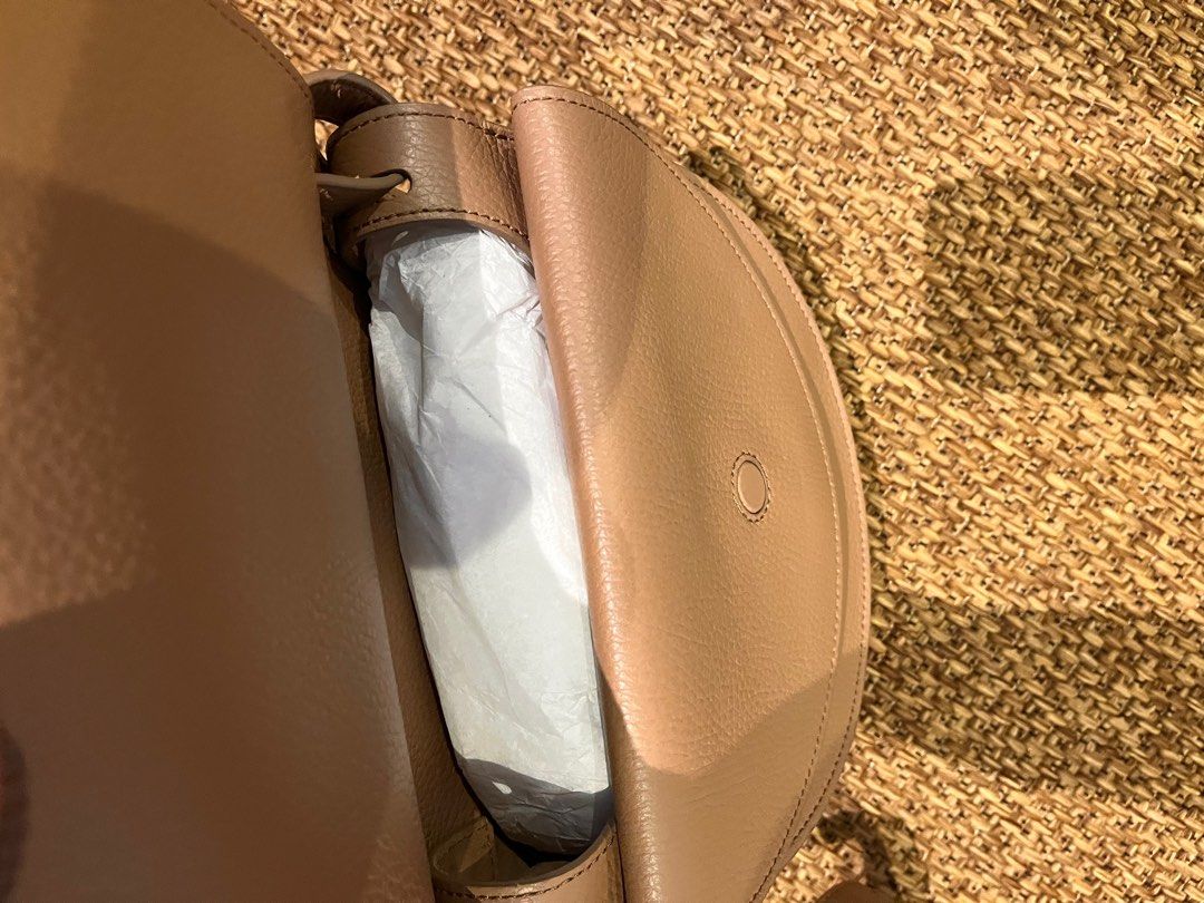 Cuyana Double Moon Saddle Bag (Category: Cross-body Bags) located in Paranaque City. Submitted by threadup (Listing ID 1402097567, Image 3). Description: • Cuyana Double Moon Saddle Bag • Cannot be bought in store anymore • good condition • too small for me .