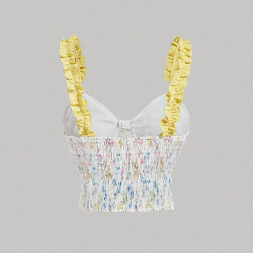 Yellow Sleeveless Floral Print Ruffle Strap Top (Category: Sleeveless) located in Manila. Submitted by chenelinn (Listing ID 1402086475, Image 2). Description: ✃ ┈ KINDLY READ !! 𖦹 ⋆｡° 📩 DM for more inquiries ✃ ┈ color may vary due to lighting 𖦹 ⋆｡° ✦ Cutesy floral top (sewed in some lace on the bottom ends: see last pic for reference) ✦ Adjustable yellow ruffle straps with tie details! ✦ Perfect for a summer and feminine look 🌻 ✦ Original pr