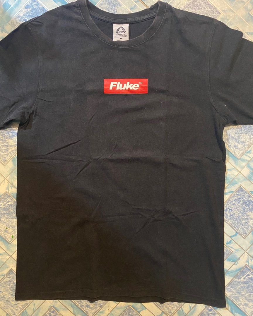 Fluke Box Logo Graphic Tshirt (Category: Tshirts & Polo Shirts ) located in Navotas City. Submitted by patrickvarg (Listing ID 1402002669, Image 3). Description: M on tag 19x27 Issue as shown in the picture.