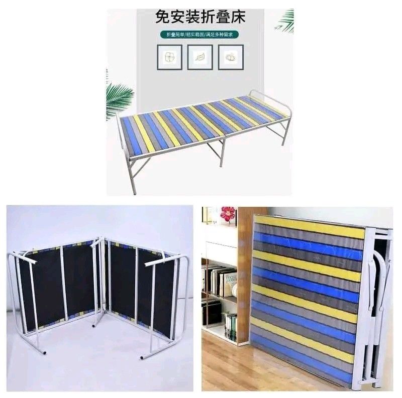 Folding Bed (Category: Bed Frames & Mattresses) located in Manila. Submitted by jelai.cybyb (Listing ID 1402048190, Image 1). Description: Folding bed features a striped mattress and a sturdy metal frame. It folds up for easy storage and transport. It's a practical solution for guests or for use in smaller spaces. The bed is easy to set up and fold away..