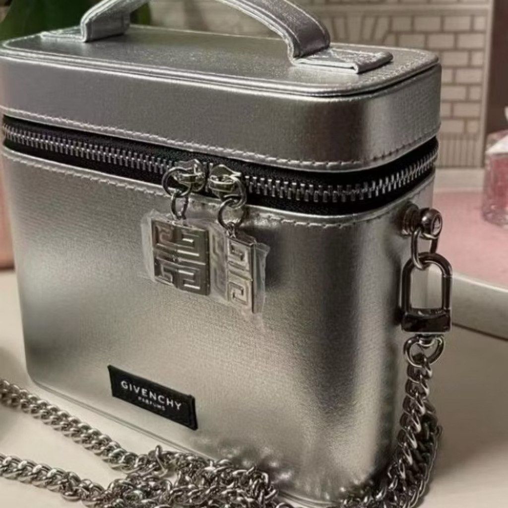 Givenchy parfums cute sling bag (Category: Luxury Bags & Wallets) located in Santa Rosa. Submitted by loveartsyluxe (Listing ID 1402073839, Image 2). Description: With sling 2,200 W/o sling 1,999.