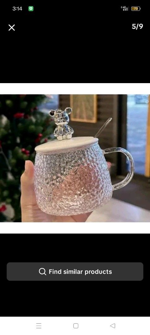 Glass Mug with Lid and Spoon (Category: Coffee & Tea Tableware) located in Quezon City. Submitted by vanessaqu83110 (Listing ID 1401982170, Image 1). Description: - Textured glass mug - Decorative bear lid - Matching spoon included - Comfortable handle - Clear design 10pcs 320 panggift pang souvenir pang personal use jnt delivery only cod.