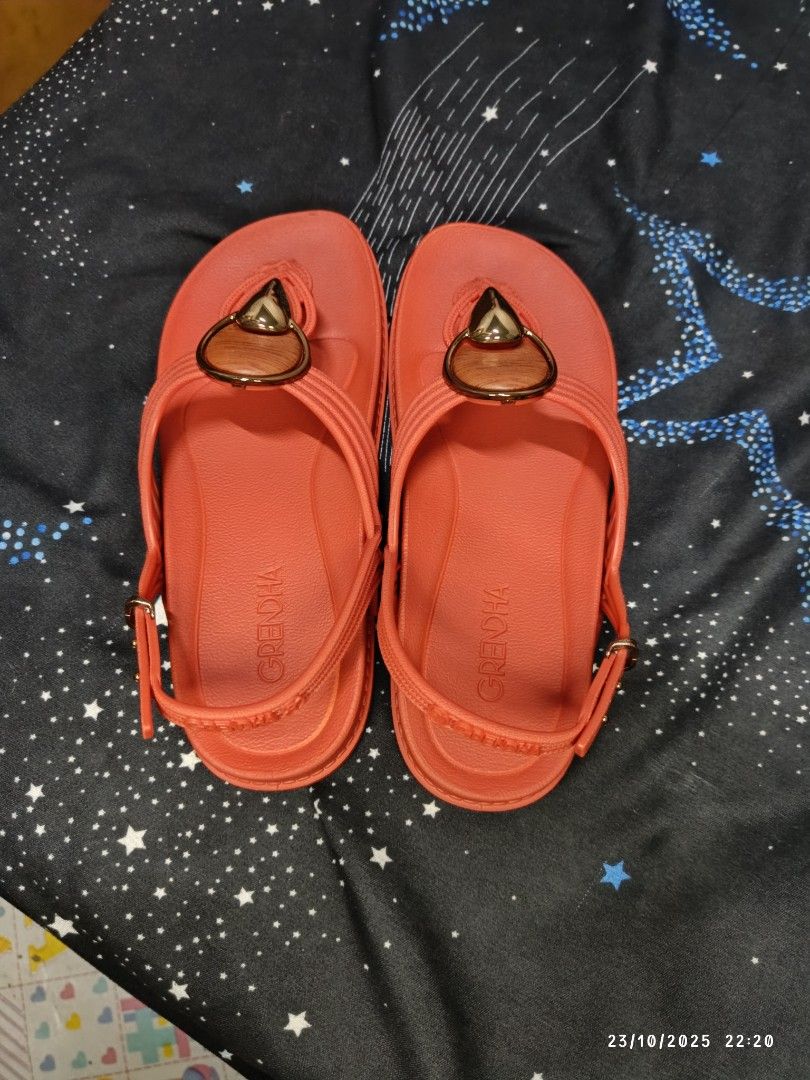 Grendha Celebrar Sand - Brown Tile Sandals (Category: Flats & Sandals) located in San Jose del Monte. Submitted by twinkletoes_ph (Listing ID 1402054700, Image 3). Description: Grendha Celebrar Sand sandals in brown tile color. Features a thong style with an adjustable strap. The sandals have a decorative element on the upper. The size is 7. Comes with the original box. Made in Brazil..
