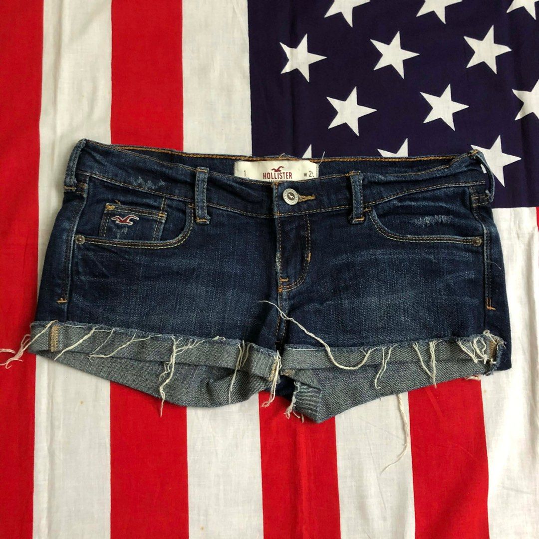 Hollister Denim Shorts - Size 25 (Category: Shorts) located in Manila. Submitted by nei00 (Listing ID 1401968171, Image 1). Description: - Hollister denim shorts - Dark wash - Size 25 - Frayed hem - Classic five-pocket design - Button and zipper closure - Hollister logo on front pocket - Made in Vietnam.