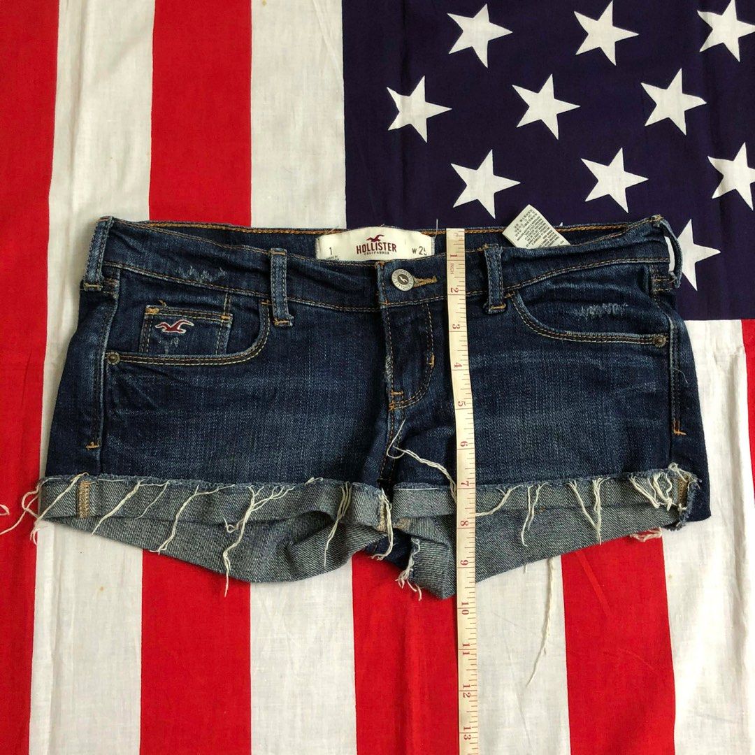 Hollister Denim Shorts - Size 25 (Category: Shorts) located in Manila. Submitted by nei00 (Listing ID 1401968171, Image 2). Description: - Hollister denim shorts - Dark wash - Size 25 - Frayed hem - Classic five-pocket design - Button and zipper closure - Hollister logo on front pocket - Made in Vietnam.