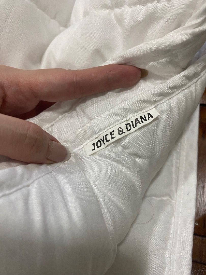 Joyce and Diana Crib Comforter (28x52") (Category: Bed Guards) located in Quezon City. Submitted by stoneyice (Listing ID 1402007322, Image 1). Description: Selling our crib comforter from Joyce and Diana! - Size: 28x52" - Has yellow stains from washing - Used for a week then stored away.