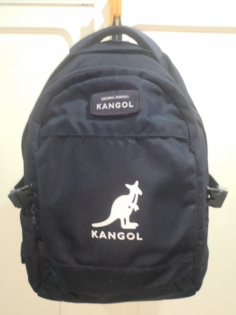 Kangol Backpack (Category: Backpacks) located in Quezon City. Submitted by jo_santos (Listing ID 1402082713, Image 1). Description: - Black Kangol backpack - Multiple compartments for storage - Features the iconic Kangol logo - Includes side pockets - Adjustable straps for a comfortable fit - Interior pockets for organization - Laptop compartment inside - Padded exterior back pack - Top handle for easy carrying - Clean, no issues - Length : 30 cm