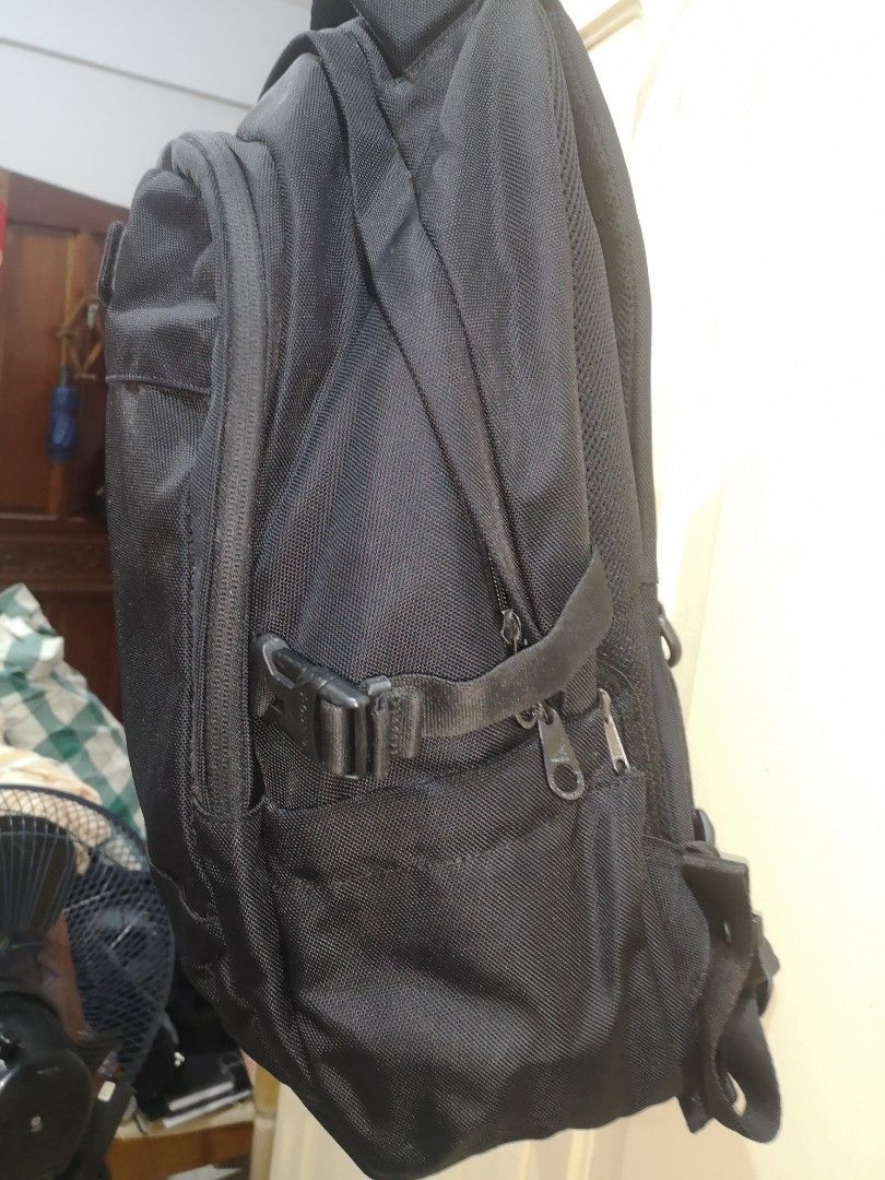 Kangol Backpack (Category: Backpacks) located in Quezon City. Submitted by jo_santos (Listing ID 1402082713, Image 3). Description: - Black Kangol backpack - Multiple compartments for storage - Features the iconic Kangol logo - Includes side pockets - Adjustable straps for a comfortable fit - Interior pockets for organization - Laptop compartment inside - Padded exterior back pack - Top handle for easy carrying - Clean, no issues - Length : 30 cm