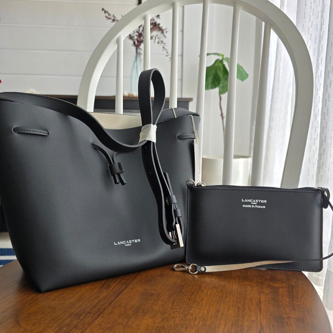 Lancaster Paris Bucket Large Bag with Pouch (Category: Luxury Bags & Wallets) located in Paranaque City. Submitted by portodimoda (Listing ID 1401950434, Image 3). Description: AUTHENTIC!!! 10,800 each Noir/ red Noir/ gold Blue/ silver - SOLD Comes with a dustbag only.