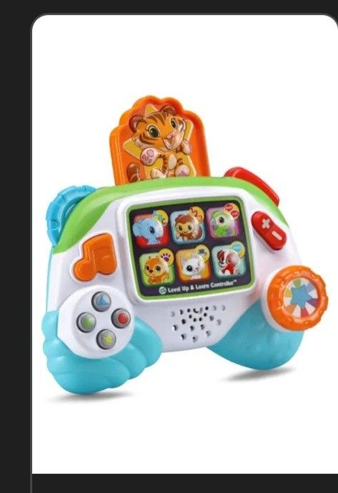 LeapFrog Level Up & Learn Controller (Category: Educational & Learning Toys) located in Singapore. Submitted by teacuptan (Listing ID 1401913311, Image 1). Description: - LeapFrog Level Up & Learn Controller - Perfect for toddlers - Features buttons and animal characters - Includes fun sounds and learning activities.