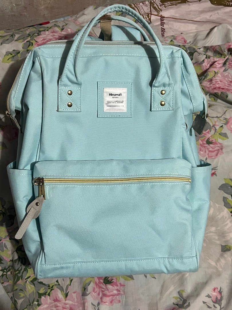 Light blue backpack (Category: Backpacks) located in Manila. Submitted by jk_lj (Listing ID 1402065832, Image 1). Description: Super cute light blue himawari backpack. Bought it for around 1999. Bagong bago pa. Napakalinis at napakatibay pa. Goods na goods sa mga students kasi sobrang daming mapaglalagyan. Sobrang daming bulsa. Halos di ko ata ito nagamit. Message lang po sa interested, if gusto pa magpasend ng more pictures and negotiable pa po 