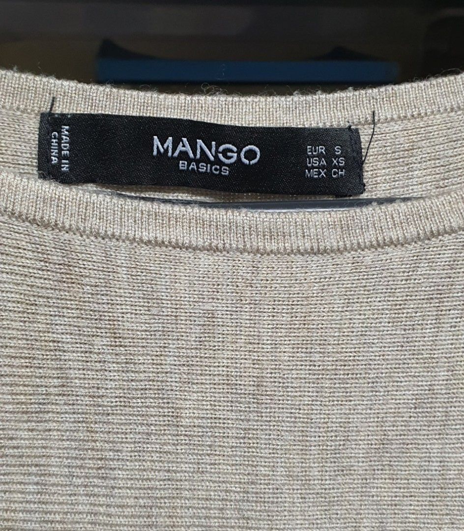 Mango Basics Sweater with Shoulder Detail (Category: Longsleeves) located in Manila. Submitted by apoltree (Listing ID 1401957225, Image 3). Description: Mango Basics sweater in a neutral beige color. Features unique shoulder detailing. The sweater has long sleeves and a round neckline. Size is S. Made in China..