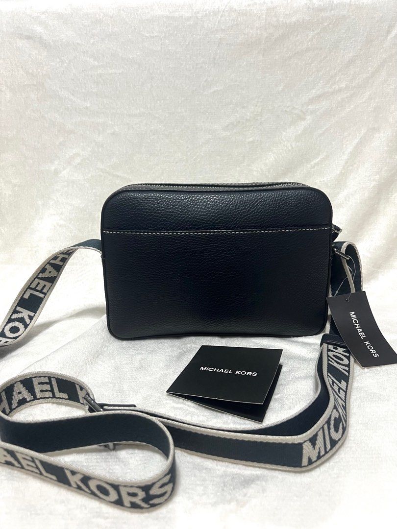 Michael Kors Cooper Denim Crossbody Bag (Category: Cross-body Bags) located in Caloocan City. Submitted by nicsbangayan (Listing ID 1402061032, Image 3). Description: FOR SALE: Michael Kors Cooper Denim Bag 101% Original & Authentic from US Inclusion: Tag Price and Care Card Condition: New, Never Been Used Price: 5500 negotiable Location: South Caloocan DM me if you're interested..