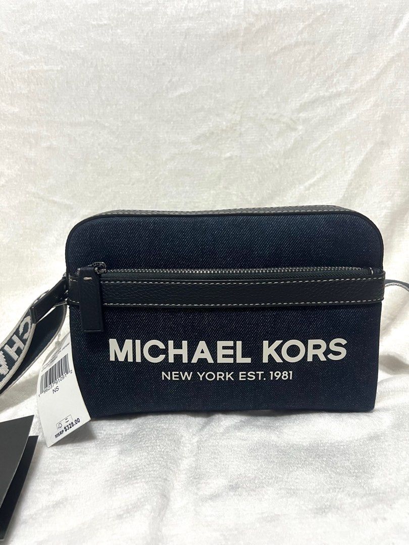 Michael Kors Cooper Denim Crossbody Bag (Category: Cross-body Bags) located in Caloocan City. Submitted by nicsbangayan (Listing ID 1402061032, Image 2). Description: FOR SALE: Michael Kors Cooper Denim Bag 101% Original & Authentic from US Inclusion: Tag Price and Care Card Condition: New, Never Been Used Price: 5500 negotiable Location: South Caloocan DM me if you're interested..