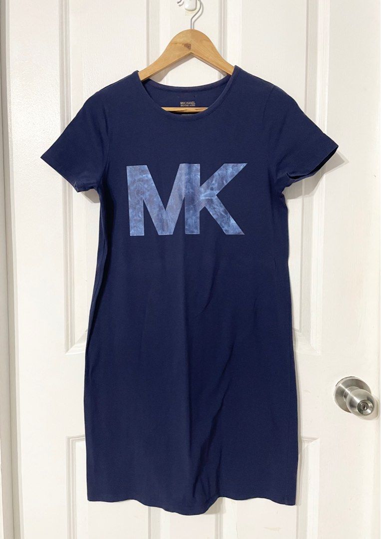 Michael Kors Navy Blue Dress (Category: Dresses) located in Manila. Submitted by somethingnewandloved (Listing ID 1402093070, Image 1). Description: Original Michael Kors Tshirt dress.