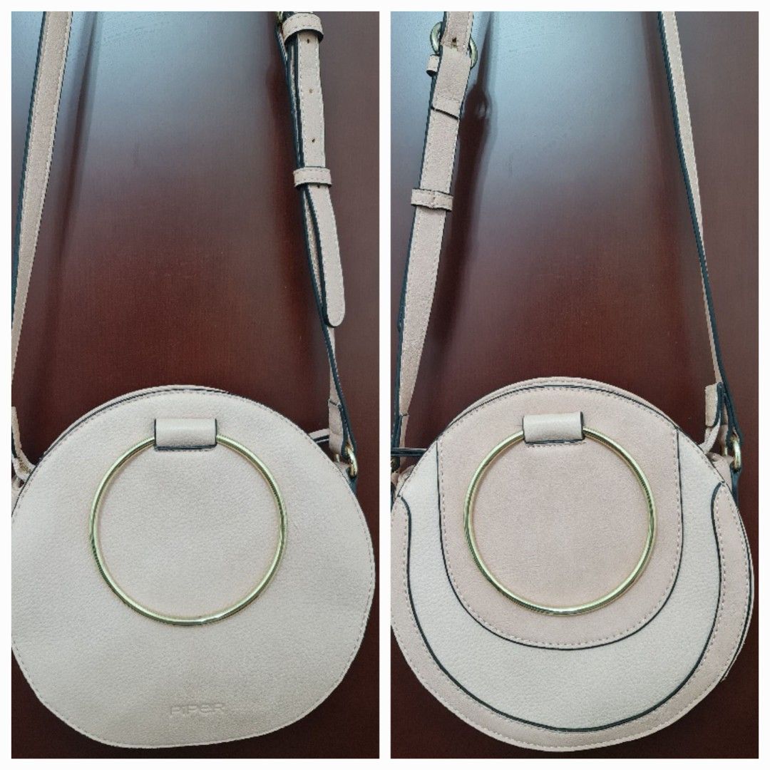 New Piper Crossbody Circle Bag (Category: Women's Bags & Wallets) located in Sydney. Submitted by desirably (Listing ID 1402051060, Image 1). Description: New Piper crossbody circle bag with gold hardware for $40. Brand new without tags&in excellent condition. Super cute&versatile. Non leather. Pick up from Marrickville. Pls feel free to check out my other listings..