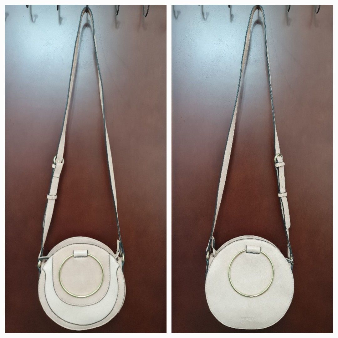 New Piper Crossbody Circle Bag (Category: Women's Bags & Wallets) located in Sydney. Submitted by desirably (Listing ID 1402051060, Image 2). Description: New Piper crossbody circle bag with gold hardware for $40. Brand new without tags&in excellent condition. Super cute&versatile. Non leather. Pick up from Marrickville. Pls feel free to check out my other listings..