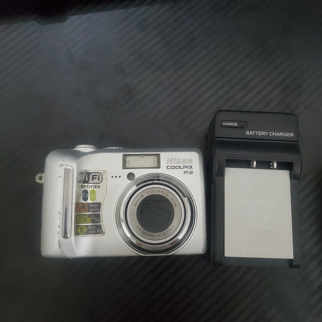 Nikon COOLPIX P2 Digital Camera (Category: Cameras) located in Baguio. Submitted by virtualgarage.sale (Listing ID 1402047804, Image 1). Description: please read all working. replacement battery na but i can also include the original if you need it for reference. universal charger included *update. tested it 11/2025. not sure kung sa settings pero mukang washed out na overexposed na kung outdoors. indoors and videos (even if bright sa labas) are 
