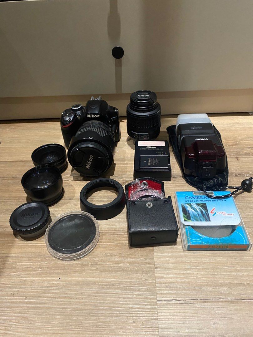 Nikon DSLR D3200 Camera (Category: Cameras) located in Manila. Submitted by artsygunda (Listing ID 1401999360, Image 2). Description: Seldom used With accessories and bag Lenses: 18-55mm basic lens 18-105cm lens.