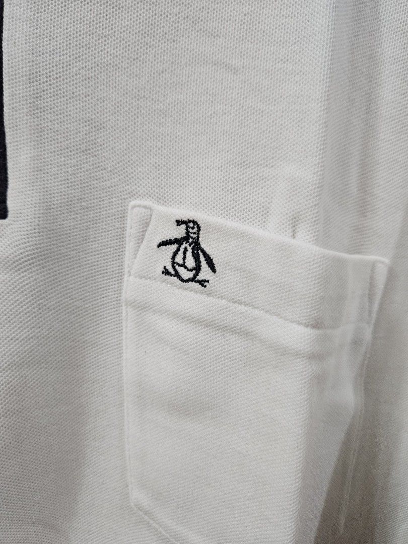 Original Penguin White Polo Shirt (Category: Tshirts & Polo Shirts ) located in Manila. Submitted by may.lc (Listing ID 1402013346, Image 3). Description: authentic very good condition.