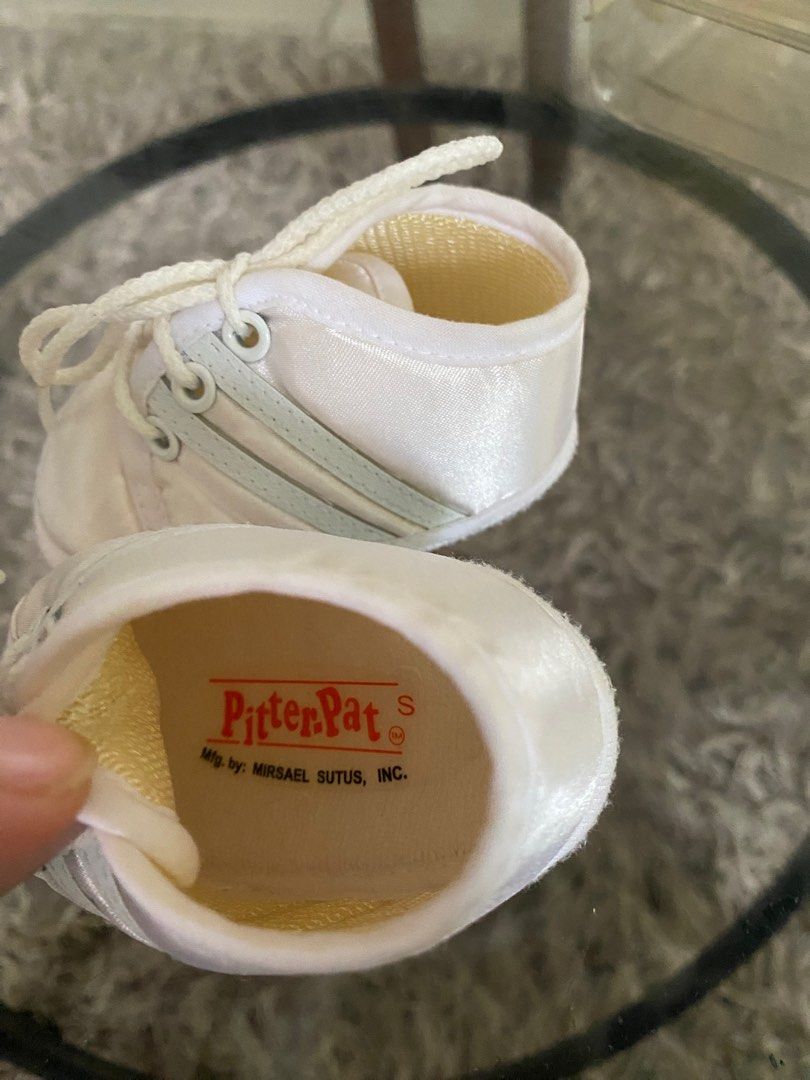 PitterPat Baby Baptismal Shoes (Category: Babies & Kids Fashion) located in Paranaque City. Submitted by declutter.ange (Listing ID 1401915772, Image 3). Description: White PitterPat baby sneakers with light blue stripes. Flaw last pic- storage stain. .
