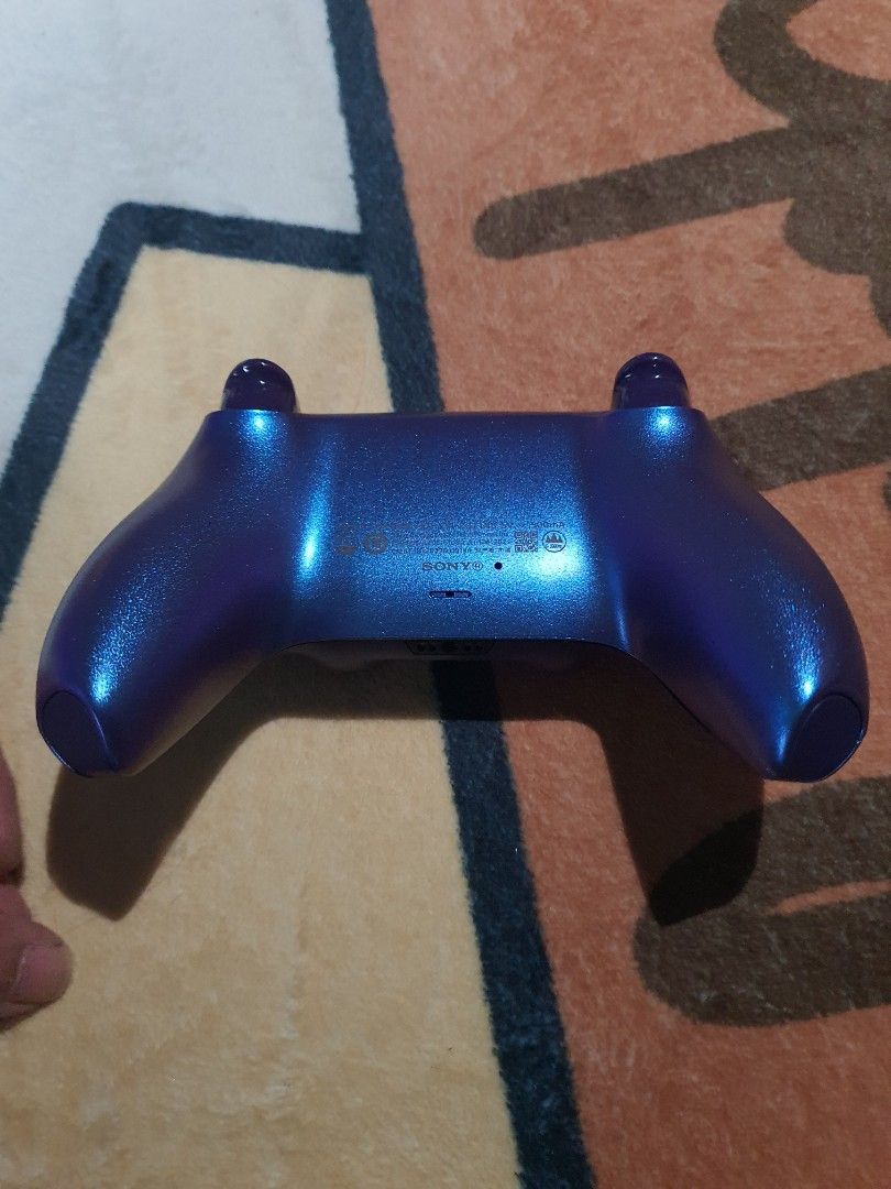 PS5 Controller (Category: Controllers) located in Singapore. Submitted by yapzer048076441 (Listing ID 1402008464, Image 2). Description: Modified PS5 controller. Clicky system allowing players to shoot faster than original controller, TMR joystick, aluminium joystick, customised casing..