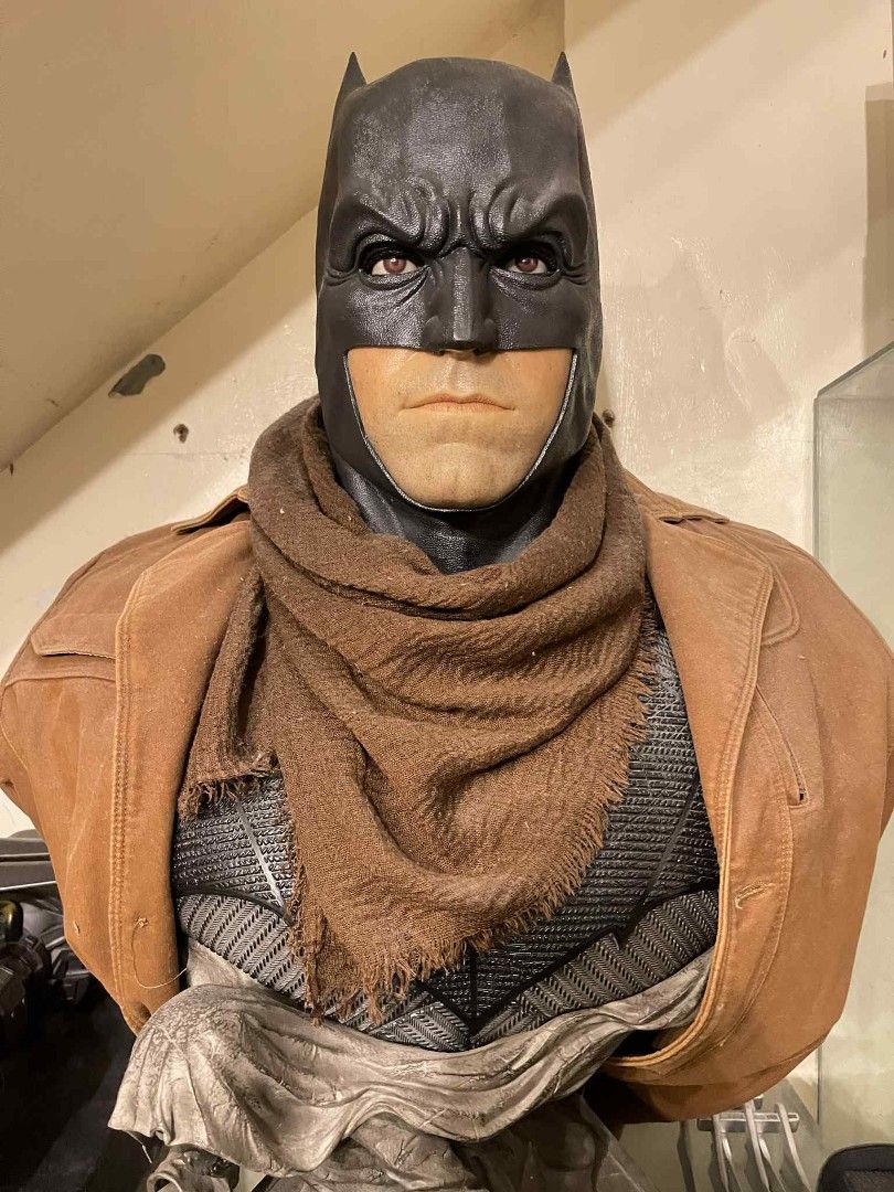 Queen Studios Batman 1:1 Bust (Category: Figurines & Statues) located in Manila. Submitted by besh__ (Listing ID 1402092133, Image 1). Description: - Queen Studios Batman bust - Features a realistic Batman likeness - Includes cowl, scarf, and jacket details - Mounted on a base with a grim reaper figure - Comes with a certificate of authenticity - A must-have collectible for Batman fans.
