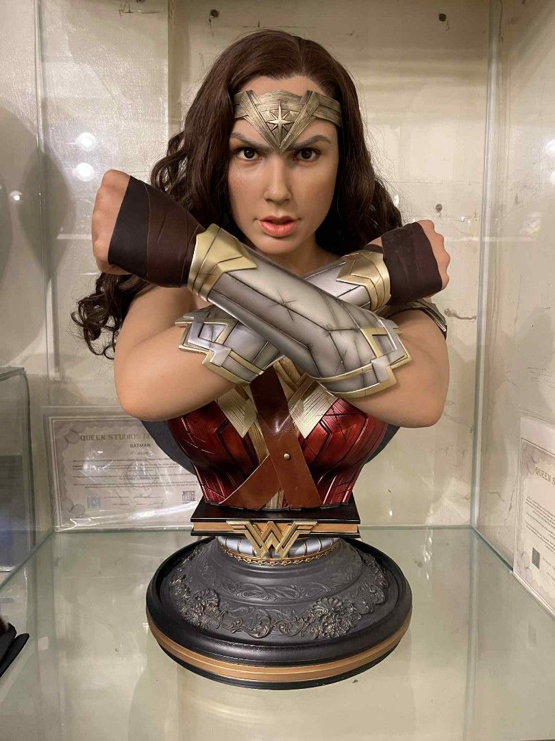 Queen Studios Wonder Woman Bust (Category: Figurines & Statues) located in Manila. Submitted by besh__ (Listing ID 1402092022, Image 1). Description: - Queen Studios Wonder Woman bust - Features Gal Gadot likeness - Iconic costume and crossed arms - Mounted on a decorative base - Includes certificate of authenticity - Great for DC Comics collectors.