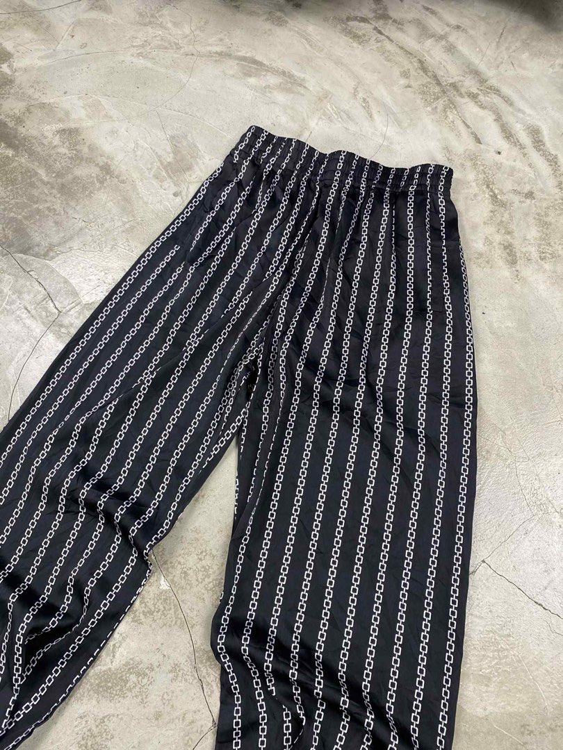 Raf Simons Archive Redux Silk Chain Pants (Category: Jeans) located in Baguio. Submitted by themgarbage (Listing ID 1401928583, Image 2). Description: Condition:Great Size Tag:S Waistline:23/36(stretchable) Full Length:39 Thighs:11.5 Opening:5.