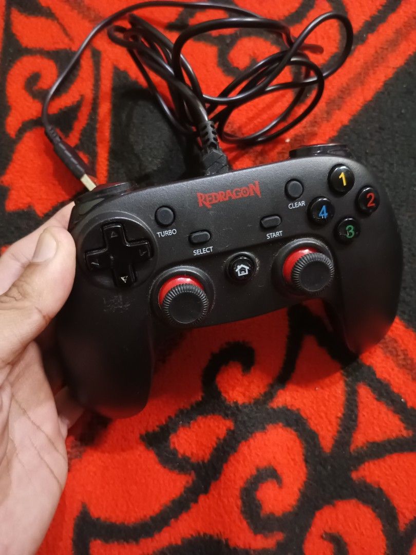 Red Dragon Saturn Gamepad analog issue (Category: Controllers) located in Quezon City. Submitted by markgolveo (Listing ID 1401935628, Image 3). Description: Red Dragon Saturn Gamepad issue is left analog stick ghosting when pressed to the left it goes right aside on the stated issue rest of the functionalities are working properly unit needs fixing.