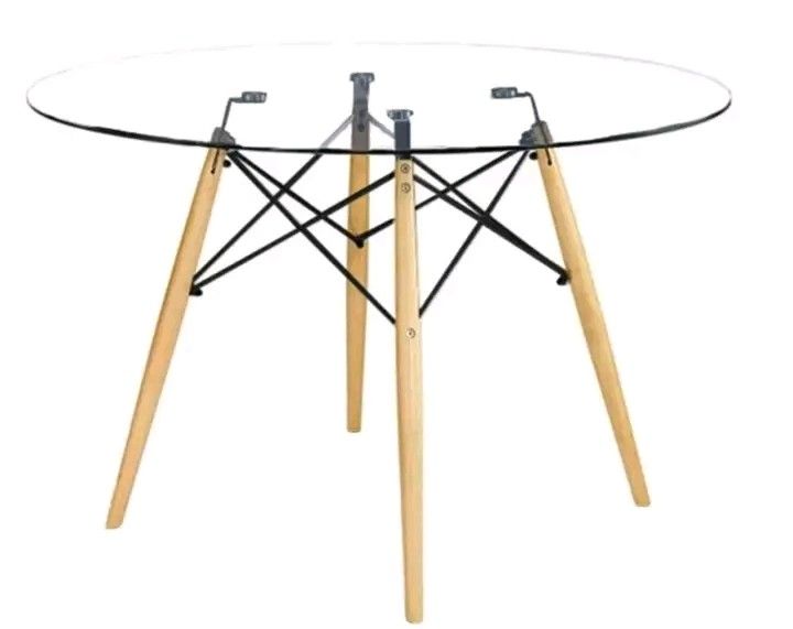 Round Glass Dining Table with Wooden Legs (Category: Tables & Sets) located in Manila. Submitted by minidivisoria (Listing ID 1402008930, Image 1). Description: Scandi Glass table round available: size 60cm size 90cm Direct message me for inquiries 📩 09674865453 .