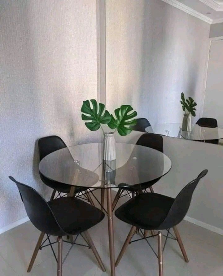 Round Glass Dining Table with Wooden Legs (Category: Tables & Sets) located in Manila. Submitted by minidivisoria (Listing ID 1402008930, Image 2). Description: Scandi Glass table round available: size 60cm size 90cm Direct message me for inquiries 📩 09674865453 .