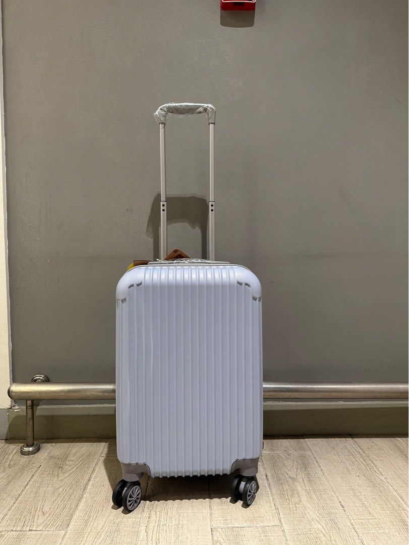 Travel basic hand carry Luggage LIGHT BLUE (Category: Luggage) located in Valenzuela. Submitted by kaelstoypalace (Listing ID 1401941817, Image 1). Description: -hand carry luggage - Spacious interior - Secure straps - Grey fabric lining - Easy-glide wheels - Zipper closure - Extendable handle - Textured exterior design.