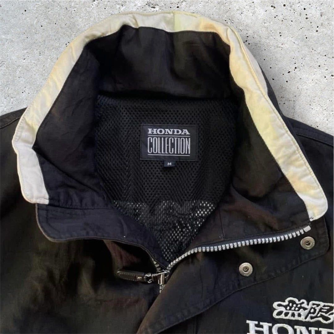 Vintage Honda Mugen Team Jacket (Category: Coats, Jackets and Outerwear) located in Manila. Submitted by jstash09 (Listing ID 1402038886, Image 3). Description: - Black Honda jacket - White accents - Honda logo on front and back - Stowable hood - Zipper and snap closures - White and black collar - From the "Honda Collection".