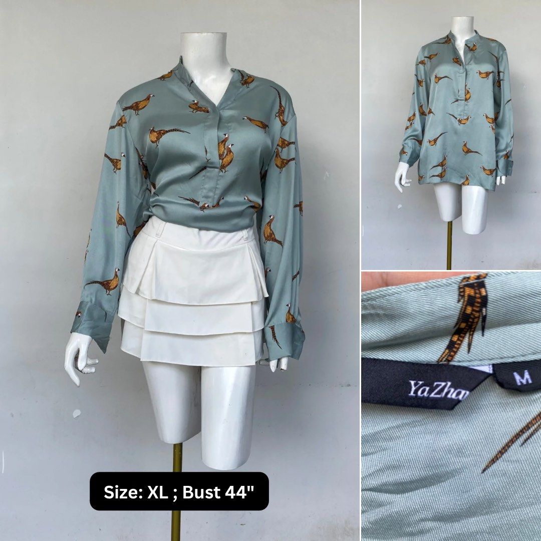 YaZha Bird Print Blouse - Size XL (Category: Blouses) located in Tarlac. Submitted by himesells (Listing ID 1401949812, Image 1). Description: - YaZha bird print blouse - Light teal color - Mandarin collar - Long sleeves - Size: XL (Tag size: M) - Bust: 44 inches - Silky material.