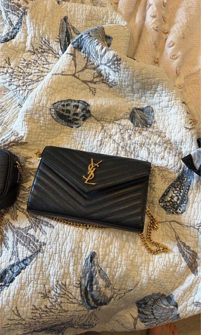 Ysl wallet on chain bag (Category: Bags & Wallets) located in Parramatta. Submitted by cndy_em (Listing ID 1401921318, Image 1). Description: Ysl wallet on chain black bag Good quality .
