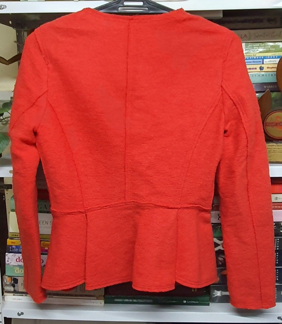 Zara Basic Orange Blazer (Category: Coats, Jackets and Outerwear) located in Manila. Submitted by apoltree (Listing ID 1401957983, Image 2). Description: - Zara Basic orange blazer - Peplum design - Size S - Made in Morocco - Textured fabric - Classic silhouette - Versatile for casual & formal wear.