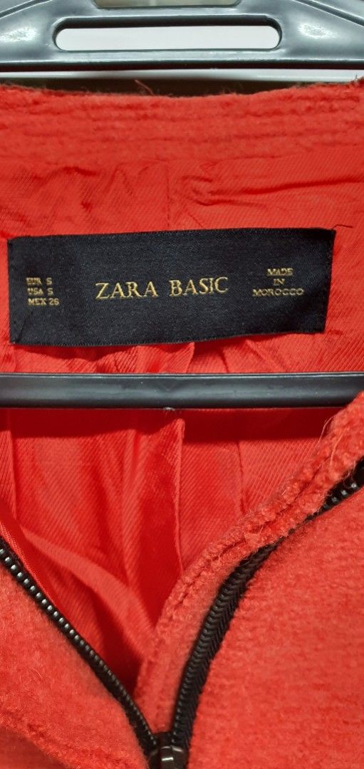 Zara Basic Orange Blazer (Category: Coats, Jackets and Outerwear) located in Manila. Submitted by apoltree (Listing ID 1401957983, Image 3). Description: - Zara Basic orange blazer - Peplum design - Size S - Made in Morocco - Textured fabric - Classic silhouette - Versatile for casual & formal wear.