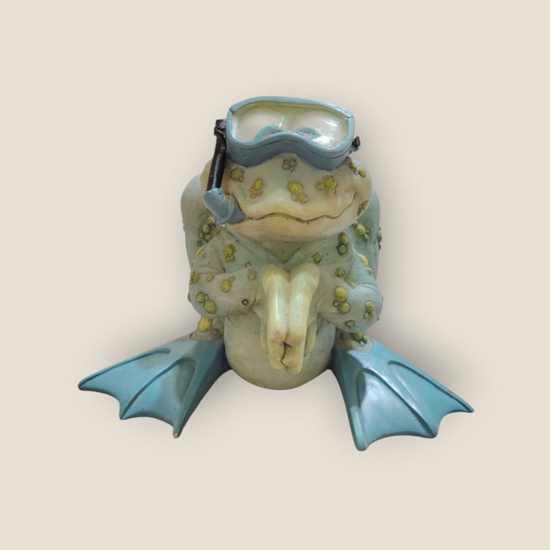 🐸 The Scuba Squad Frog (Category: Figurines & Statues) located in San Pablo. Submitted by stuff_happens_co124 (Listing ID 1407172981, Image 2). Description: A delightful whimsical frog figurine in full scuba gear—a charming piece crafted with intricate detail and a smooth resin finish. This playful amphibian brings a splash of fun and unexpected charm to any space, making him perfect for a pond edge, bathroom windowsill, or garden corner. A uniq