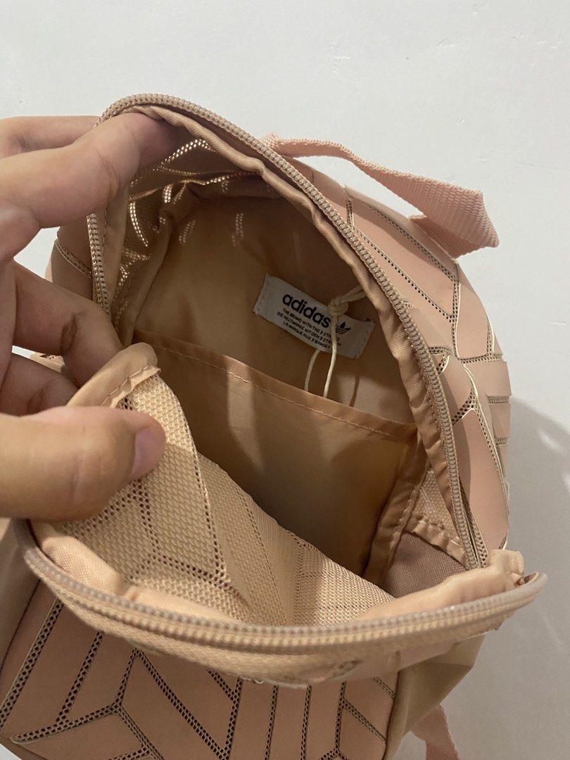 ADIDAS MINI BACKPACK (Category: Backpacks) located in Las Pinas. Submitted by restylewithraf (Listing ID 1407068640, Image 2). Description: ADIDAS MINI BACKPACK (PINK) very cute!!! bought this sa japan and since then hindi ko pa siya nagagamit. nagka issue lang siya because of my leather wallet. nakastock lang sa drawer and sa super init dumikit yung kulay ng leather huhu but its not that visible unless you look closely. other than that, no issue