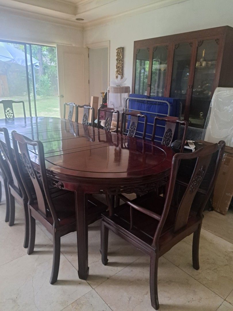 Antique Wooden Dining Table Set (Category: Tables & Sets) located in Makati City. Submitted by corglee (Listing ID 1407092920, Image 3). Description: ☆RARE Antique Vintage Oriental Dining Set ● 12 seater ●Solid RoseWood ●L 113.5 x W45.5 X H 30.5 in. ●Imported ●Intricate carvings on table edges ●Matching chairs with detailed backrests ●Never Used, just displayed ●P250,000 ●Retail Price : Approx USD $10,500 = P615,613 ●Pick Up: Ayala Alabang **Pls 