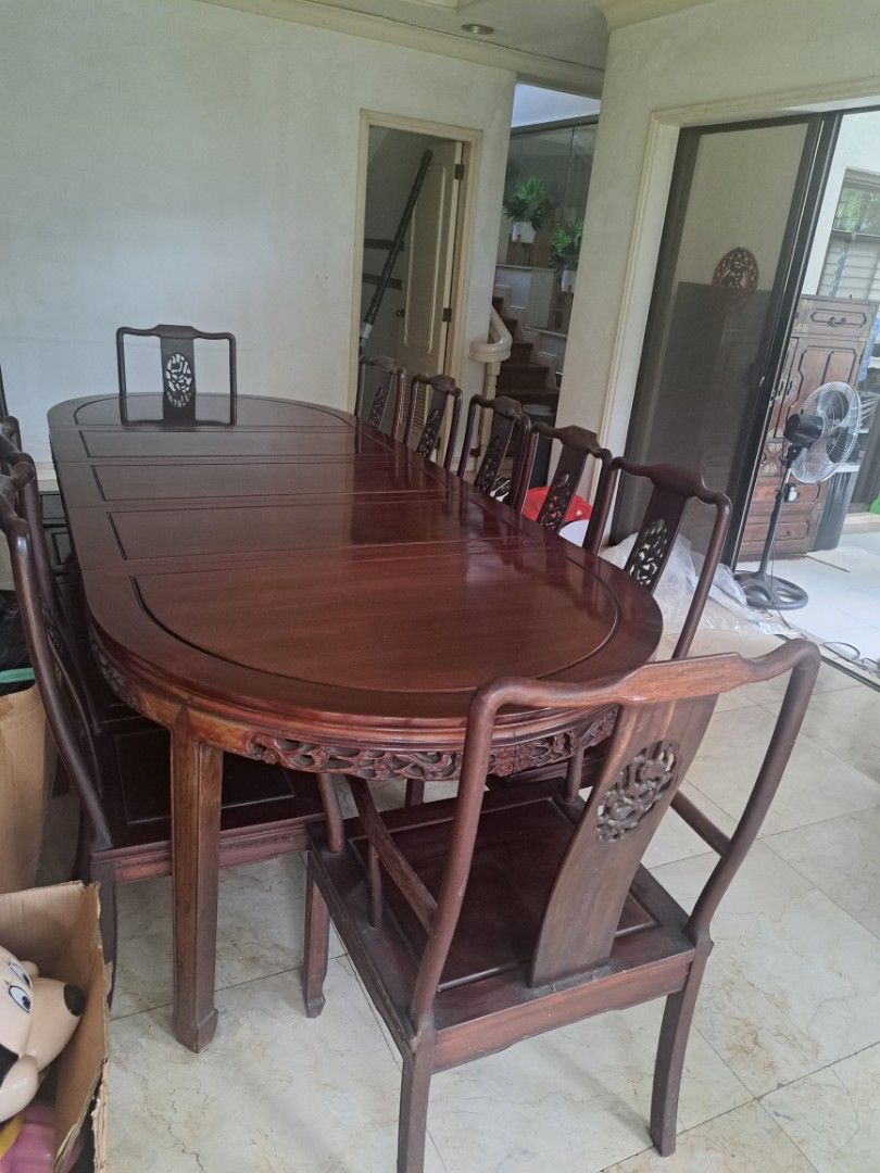 Antique Wooden Dining Table Set (Category: Tables & Sets) located in Makati City. Submitted by corglee (Listing ID 1407092920, Image 2). Description: ☆RARE Antique Vintage Oriental Dining Set ● 12 seater ●Solid RoseWood ●L 113.5 x W45.5 X H 30.5 in. ●Imported ●Intricate carvings on table edges ●Matching chairs with detailed backrests ●Never Used, just displayed ●P250,000 ●Retail Price : Approx USD $10,500 = P615,613 ●Pick Up: Ayala Alabang **Pls 