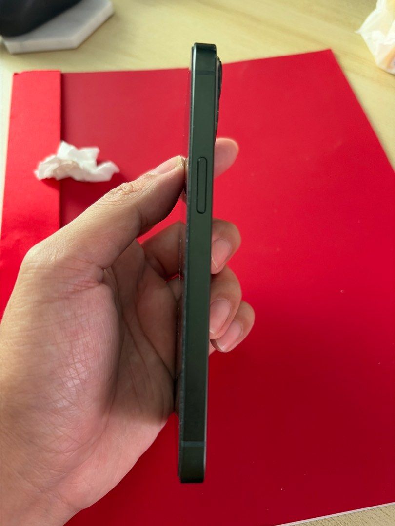 (Category: iPhone 13 Series ) located in Singapore. Submitted by cocodinoo (Listing ID 1407051099, Image 3). Description: - iPhone 13 (Green) for sale - Screen is scratch-free - Includes phone only - i can throw in box and used cable for free if wanted .