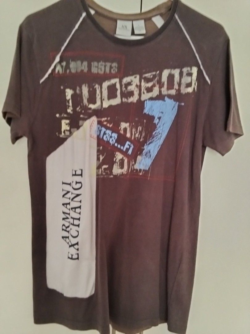 Armani Exchange Graphic Tee - Large (Category: Tshirts & Polo Shirts ) located in Quezon City. Submitted by maniladeclutter (Listing ID 1407146788, Image 1). Description: ORIGINAL - Armani Exchange graphic tee - Color: Gray - Size: Large - Design: Printed logo - Material: 100% cotton - Features: Crew neck, short sleeves A bit fading.
