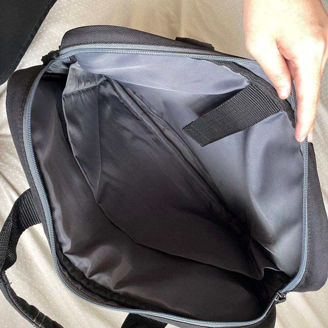 ASUS Laptop Bag with Shoulder Strap (Category: Laptop Bags & Sleeves) located in Muntinlupa City. Submitted by fika_thriftshop (Listing ID 1407114191, Image 3). Description: -Flaws: cracking and falling down of black synthetic leather layer on the bottom of the handles. If you remove those, you will be left with a gray fabric layer only which is still intact as seen in the photos. -The insides are intact and well-maintained. No staining whatsoeve
