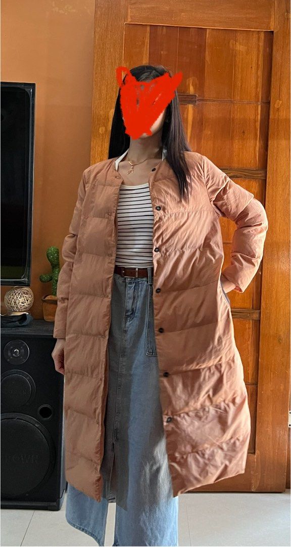 Beige Long Puffer Coat (Category: Coats, Jackets and Outerwear) located in Pasig City. Submitted by espnyl07 (Listing ID 1407049667, Image 3). Description: Beige Coat Puffer ✅ Size M to L ✅ Perfect for Autumn / Winter / Spring ✅ With 2 side pockets For reference on pict: 5'5" height 📍Bulacan weekends 📍near SM Megamall during weekdays (prior advise is needed if dito ang pickup).