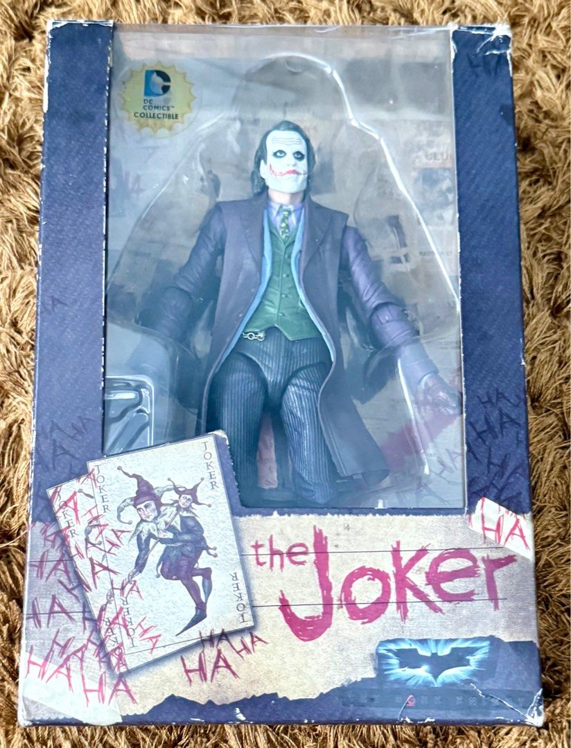 (BIB) Neca The Dark Knight Joker (Category: Figurines & Statues) located in General Trias. Submitted by miggys_booth (Listing ID 1407133015, Image 1). Description: (BIB) Neca The Dark Knight Joker Box not in good condition .